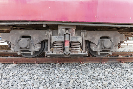 closeup wheel break and suspension system of diesel trainの写真素材