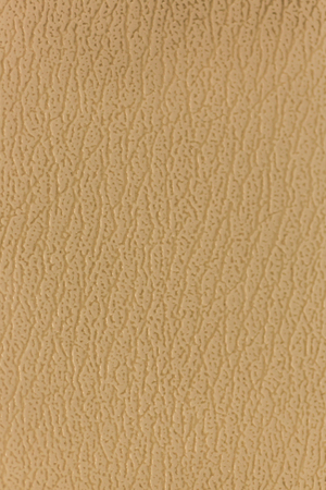 Surface of the sofa made of artificial leather backgroundの写真素材