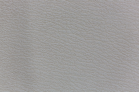Surface of the sofa made of artificial leather backgroundの写真素材