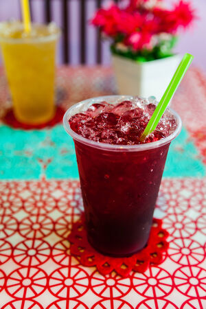 traditional thai drink,Iced roselle juice  on the tableの写真素材