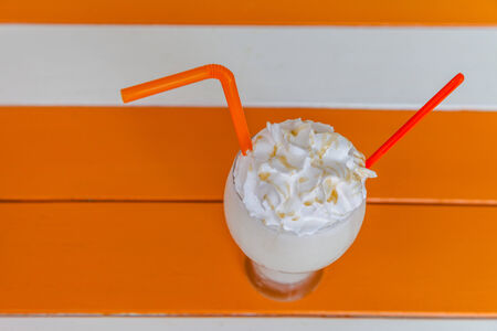 milk shake with whip cream backgroundの写真素材