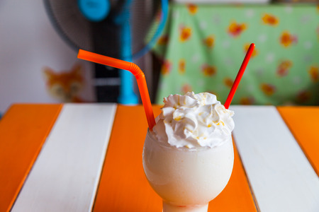 milk shake with whip cream backgroundの写真素材