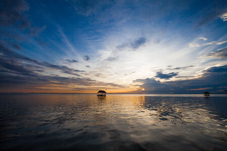 Pontoon floating in the water at sunsetの写真素材