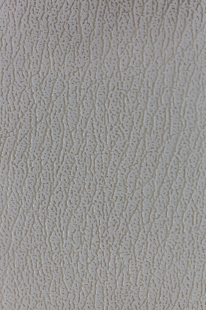 Surface of the sofa made of artificial leather backgroundの写真素材