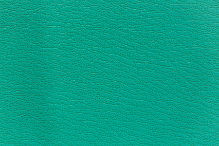 Surface of the sofa made of artificial leather backgroundの写真素材