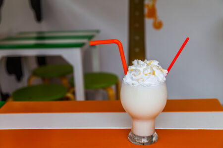 milk shake with whip cream backgroundの写真素材