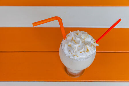milk shake with whip cream backgroundの写真素材