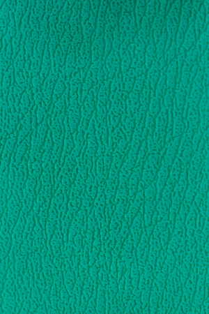 Surface of the sofa made of artificial leather backgroundの写真素材