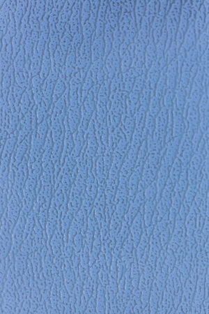 Surface of the sofa made of artificial leather backgroundの写真素材