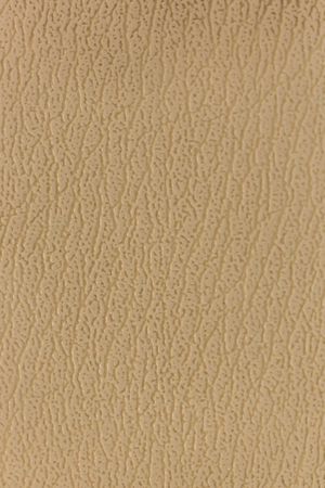 Surface of the sofa made of artificial leather backgroundの写真素材