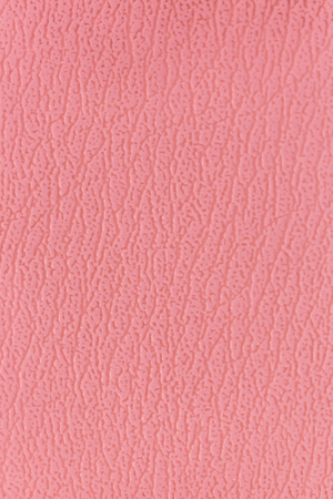 Surface of the sofa made of artificial leather backgroundの写真素材