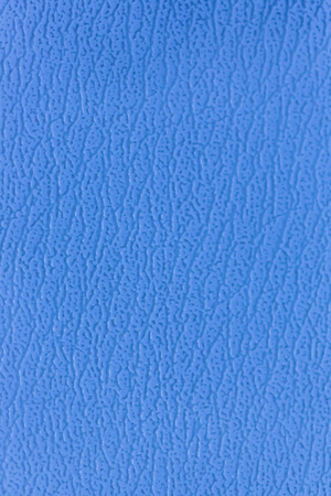 Surface of the sofa made of artificial leather backgroundの写真素材