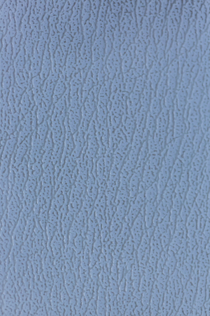 Surface of the sofa made of artificial leather backgroundの写真素材