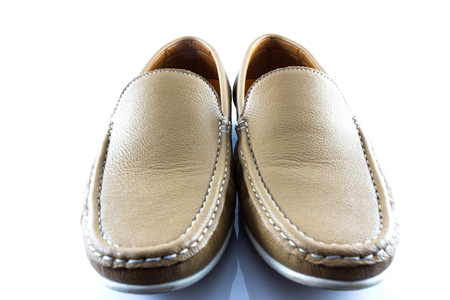 Men's classic leather brow shoes in white backgroundの写真素材