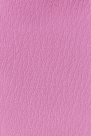 Surface of the sofa made of artificial leather backgroundの写真素材