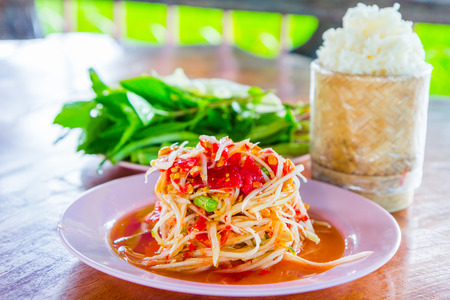green papaya salad with sticky rice ,Thai favorite foodの写真素材