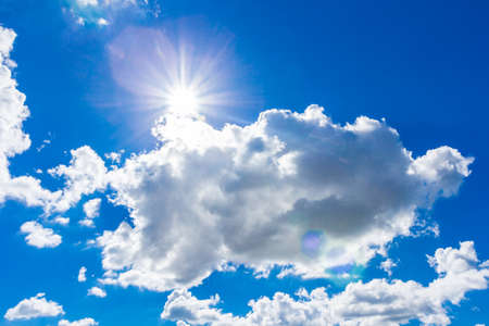 Clound in blue sky and sun for blackgroundの写真素材