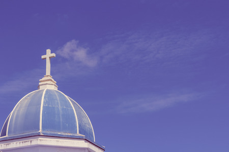 big white cross on blue skyの写真素材