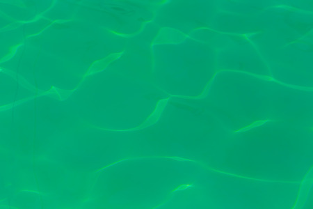 pool water reflecting in the sunの写真素材