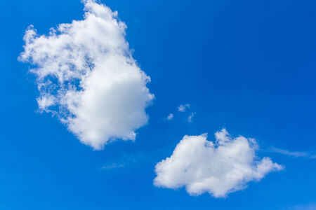 Blue sky with clouds backgroundの写真素材