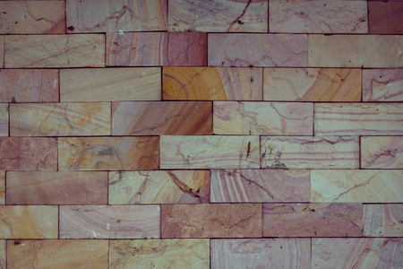 stone wall made with blocks backgroundの写真素材