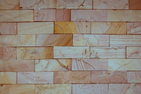 stone wall made with blocks backgroundの写真素材