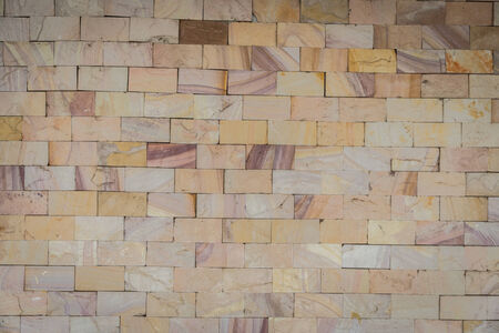 stone wall made with blocks backgroundの写真素材