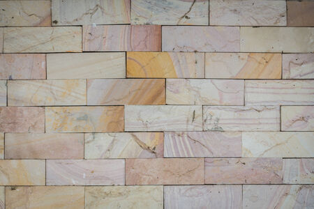 stone wall made with blocks backgroundの写真素材