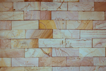 stone wall made with blocks backgroundの写真素材