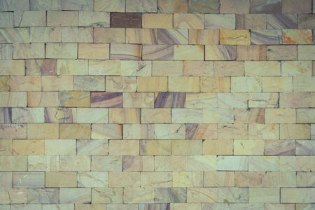 stone wall made with blocks backgroundの写真素材