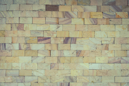 stone wall made with blocks backgroundの写真素材