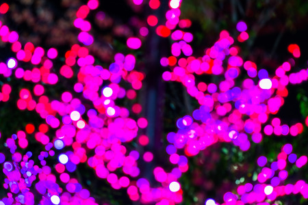 Multicolored defocused lights backgroundの写真素材