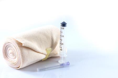 Elastic bandage roll on white backgroundの写真素材