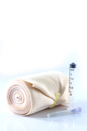 Elastic bandage roll on white backgroundの写真素材