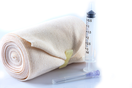 Elastic bandage roll on white backgroundの写真素材