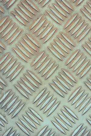 Old stainless steel floor plate textureの写真素材
