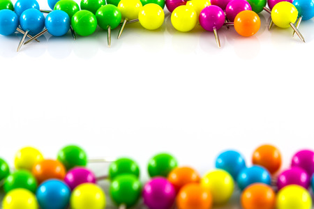 Colourful pushpins on white の写真素材