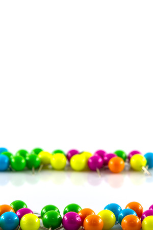 Colourful pushpins on white の写真素材