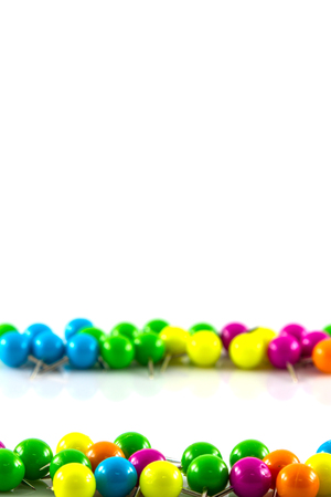 Colourful pushpins on white の写真素材