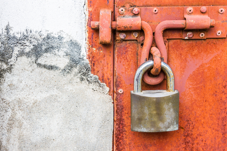 metal door with lock  and rustの写真素材