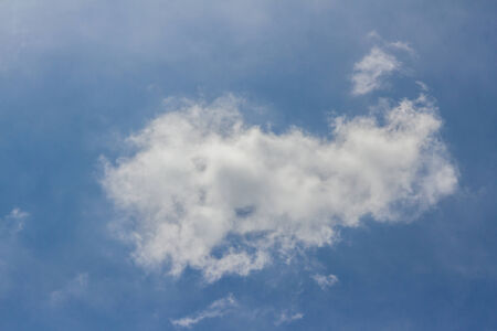 blue sky background with white cloudsの写真素材