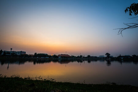 sunset of city on the park silhouetteの写真素材