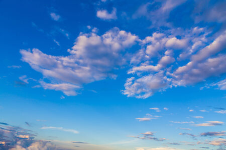 blue sky with tiny clouds backgroundの写真素材