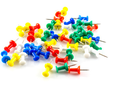 colorful push pins on white .の写真素材
