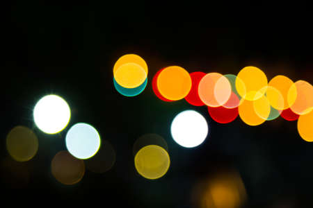 Color Bokeh against a dark の写真素材