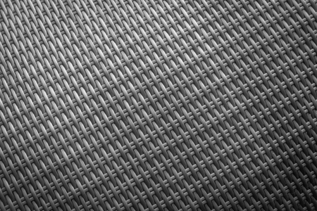 Synthetic rattan texture weaving background as used on outdoor garden furniture.