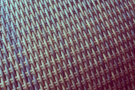 Synthetic rattan texture weaving background as used on outdoor garden furniture.