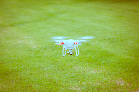 flying drone with camera on the floor prepair to flyの写真素材