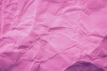 Pink crumpled paper backgroundの写真素材