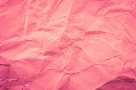 Pink crumpled paper backgroundの写真素材